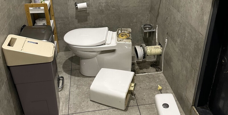 A toilet being worked on